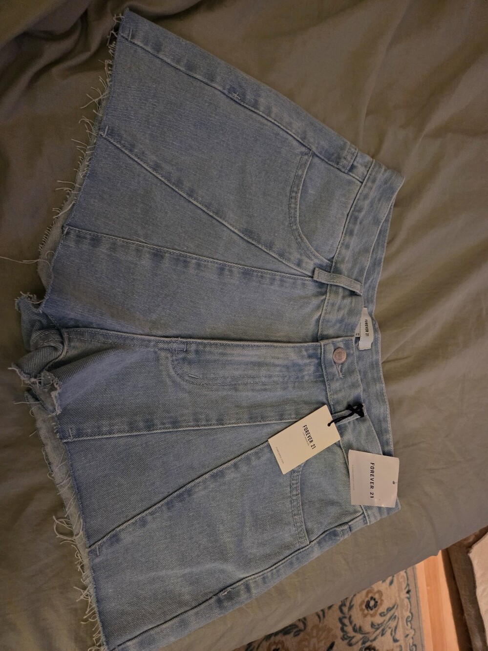 Light Blue Denim Shorts with Frayed Hem